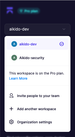 「Pro」プランの「aikido-dev」ワークスペースメニュー。チームと設定のオプションが表示されている